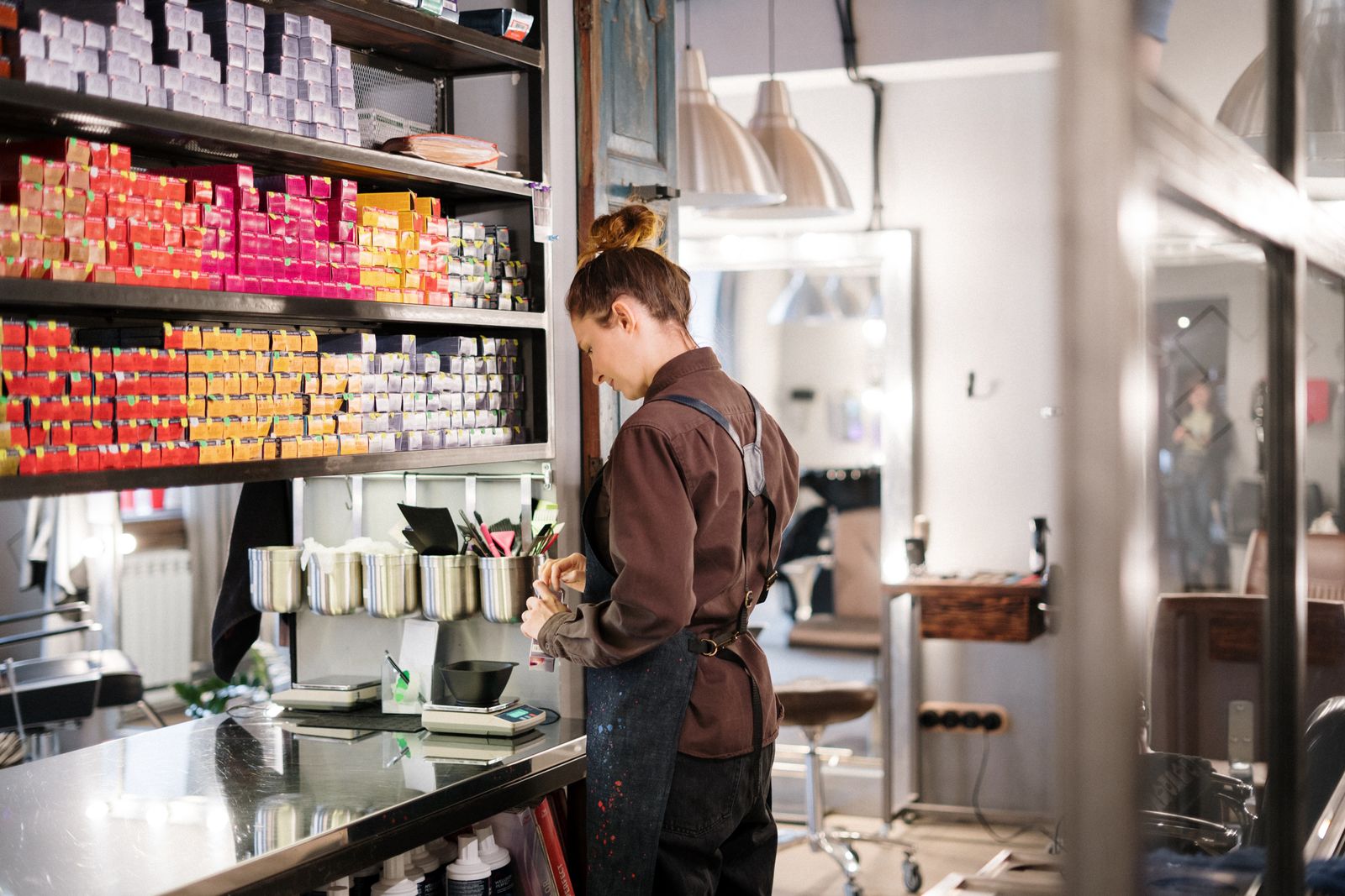 Theo Alvarez at the color bar choosing a formula